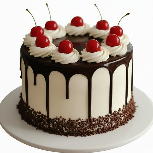 Chocolate cake with white frosting, cherries, and chocolate drizzle on a white background