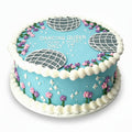 Decorative birthday cake with blue icing, white decorations, and text 'Dancing Queen Young & Sweet Only 17'.