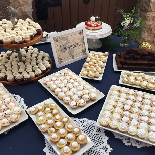 Assorted pastries on a table with a decorative setting