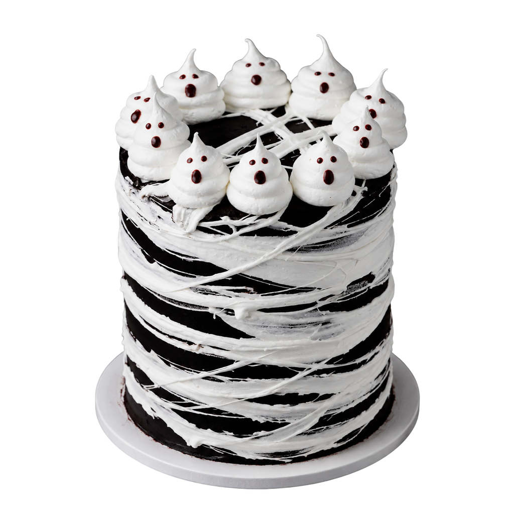 Black-and-white Halloween cake with white marshmallow webbing and playful buttercream ghost toppers, handcrafted by The Makery Cake Co in Denver.