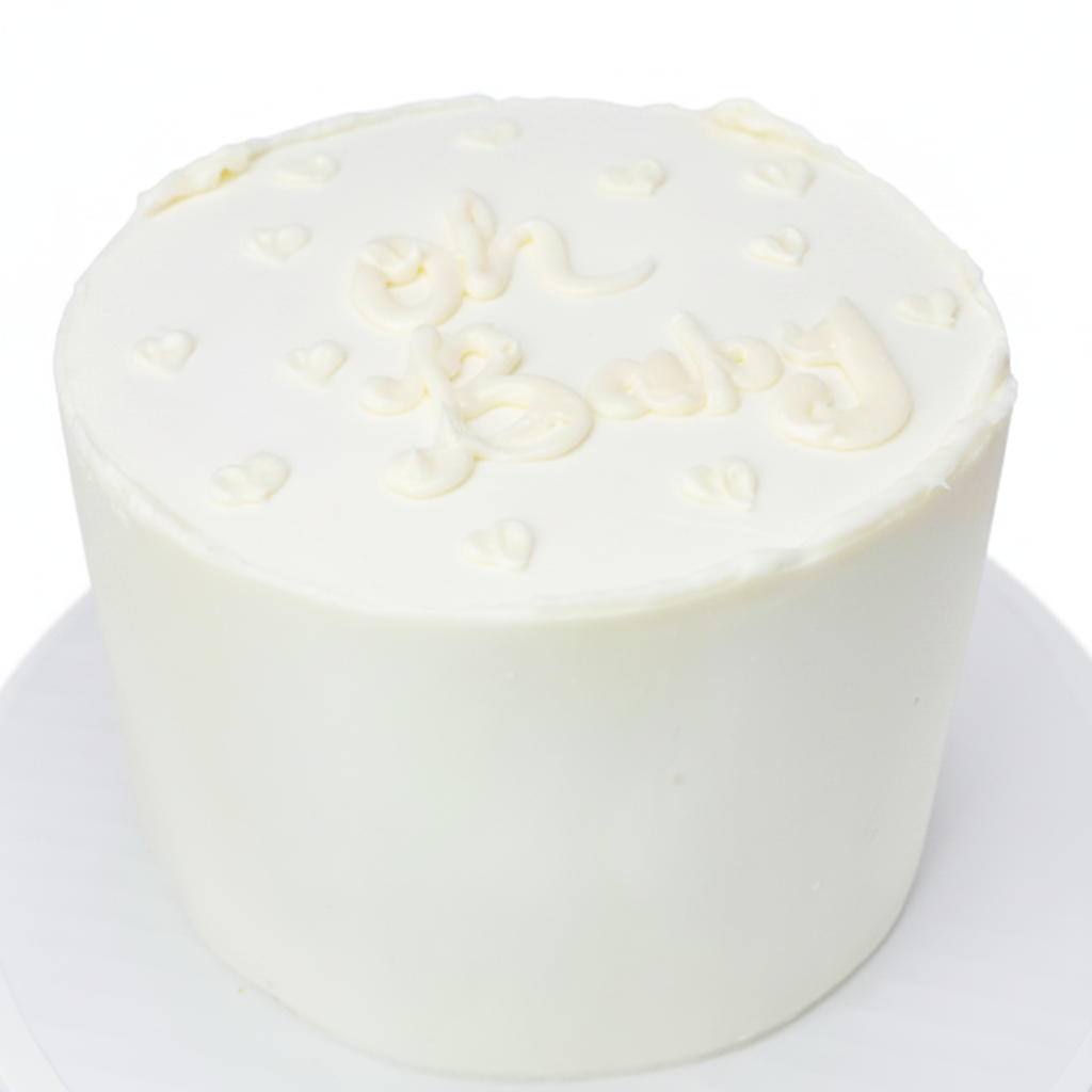 All white gender reveal cake with colored filling to match the baby's sex